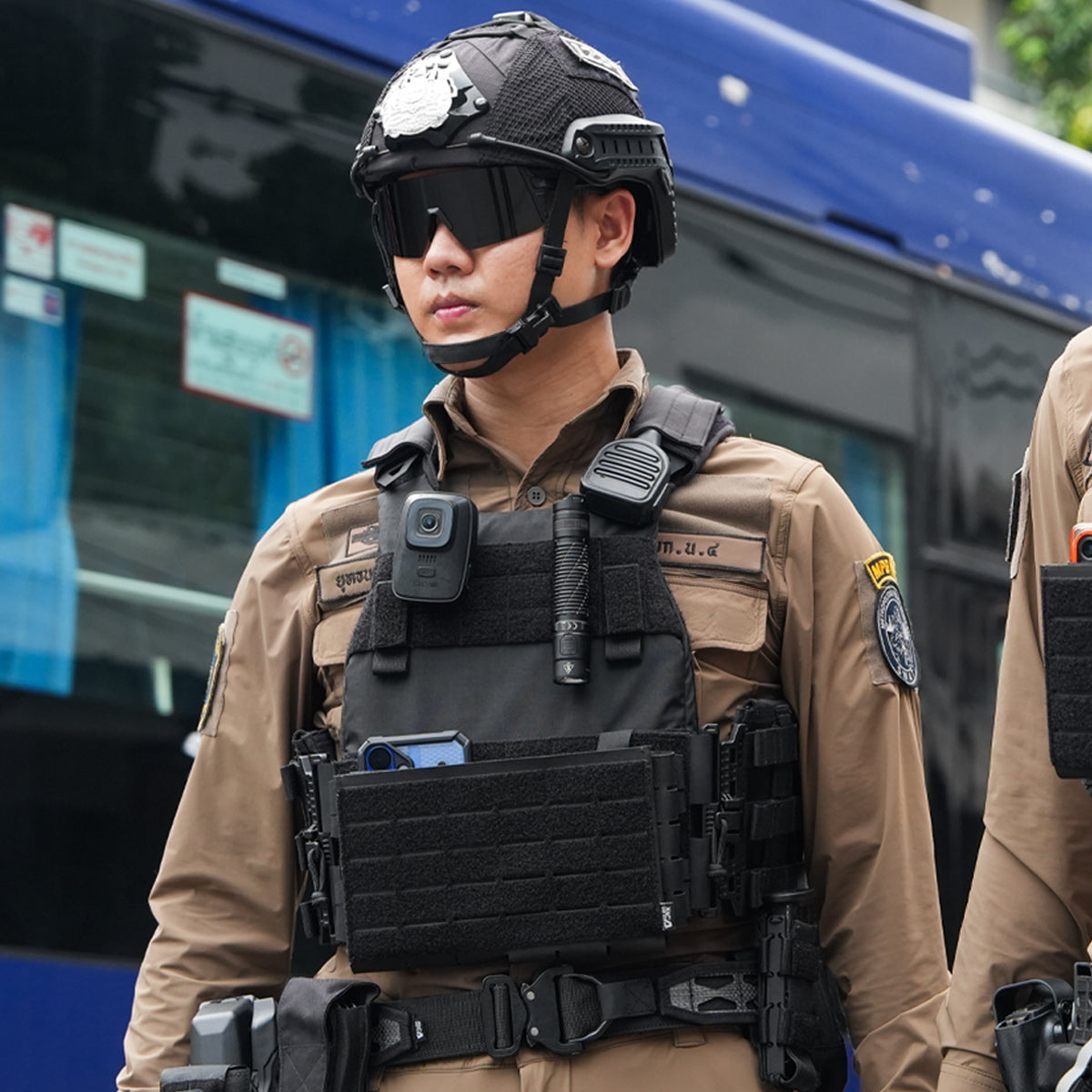 Thai Police Officer in Full Tactical Gear with FAST Helmet Plate Carrier and Body Camera