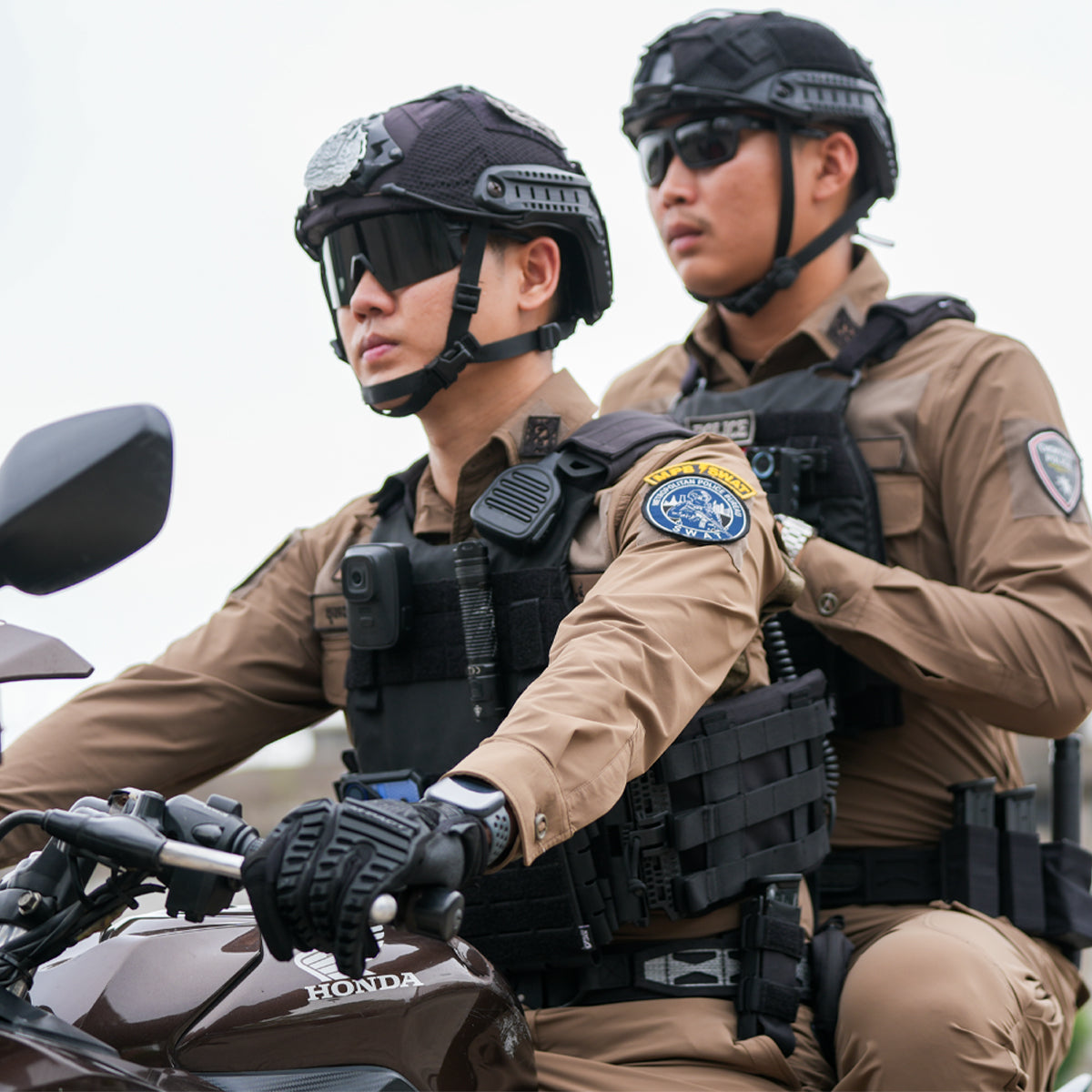 Thai Police Officers on Honda Motorcycle in Tactical Vests with SWAT Unit Patch - Side View