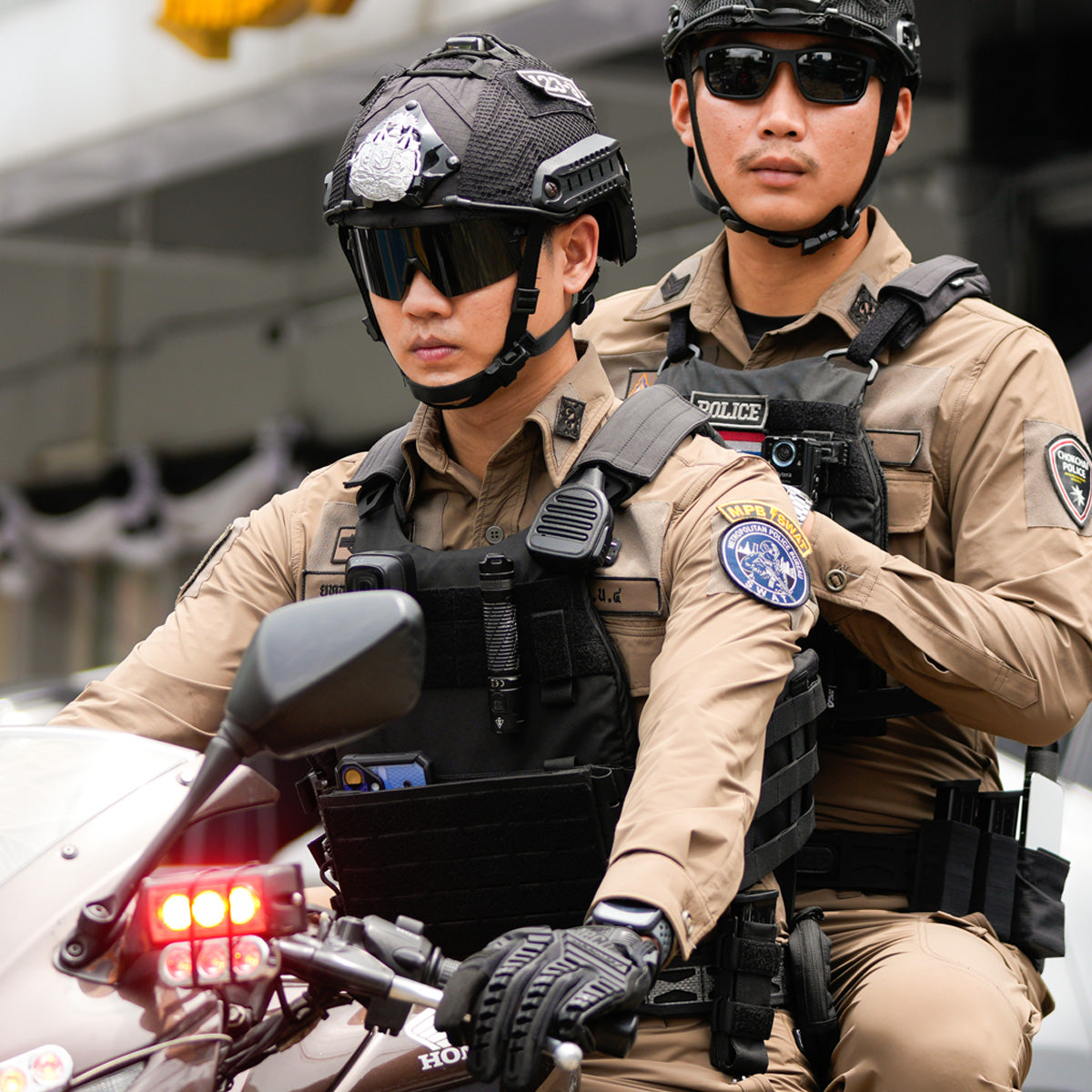 Thai Police Officers on Motorcycle with Emergency Red Light Active - Tactical Police Response Unit