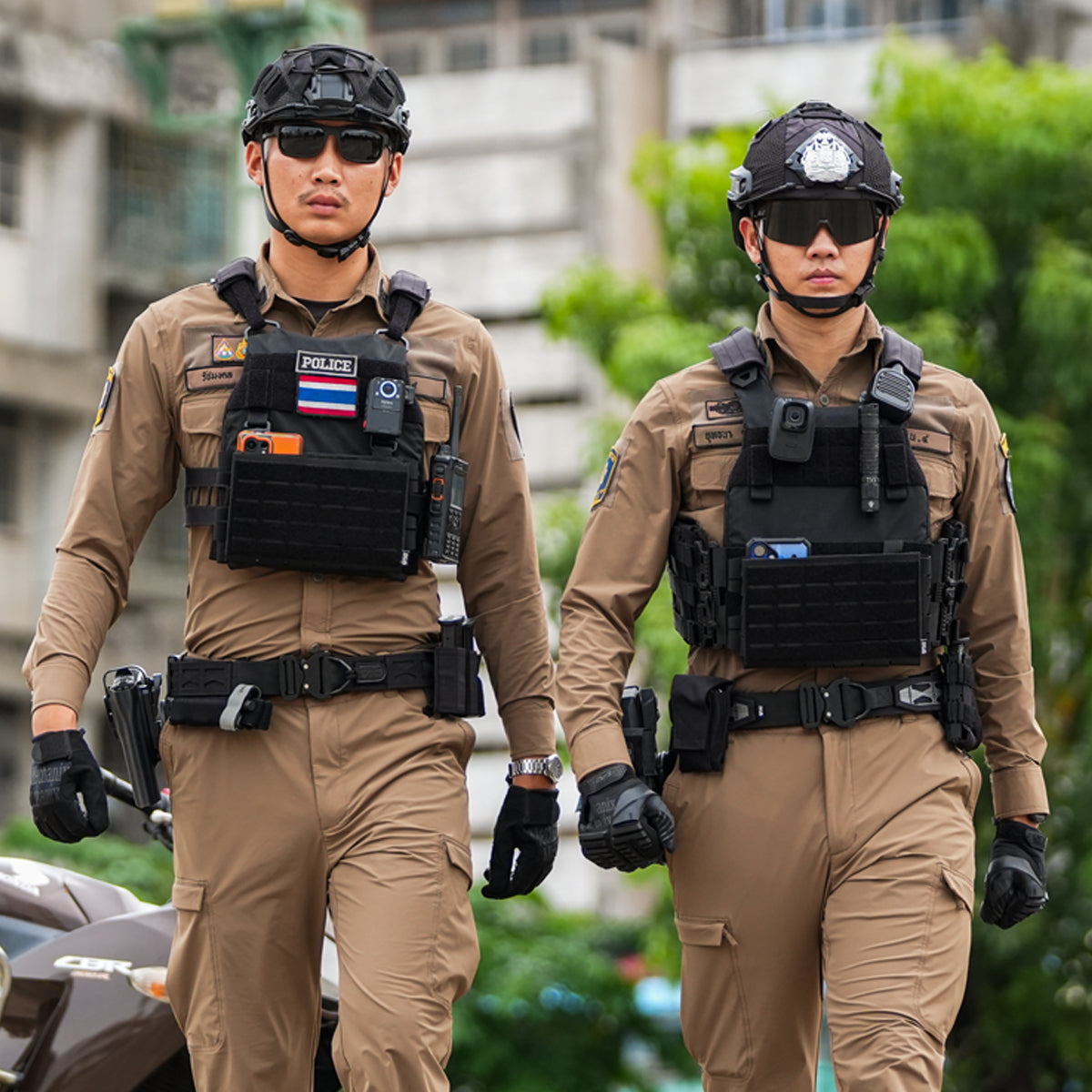 Two Thai Police Officers Walking in Full Tactical Gear Plate Carriers and Combat Helmets - Bangkok Patrol